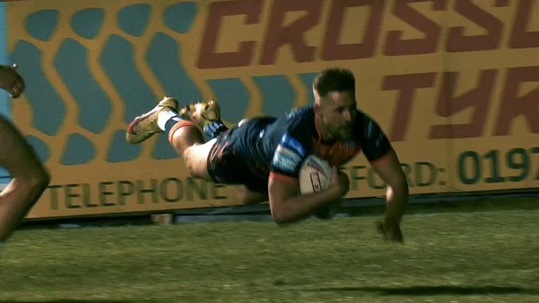 Greg Eden finishes off an end-to-end try after Paul McShane intercepts a Wakefield Trinity attack to extend Castleford Tigers lead