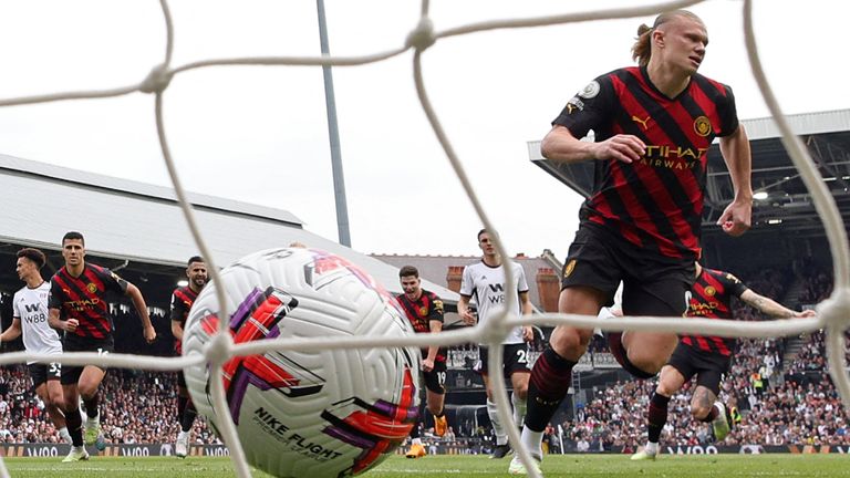 Erling Haaland wheels away after scoring his 50th goal of the season