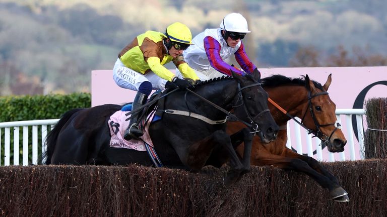 Galopin Des Champs and Bravemansgame jump the last together in the Cheltenham Gold Cup