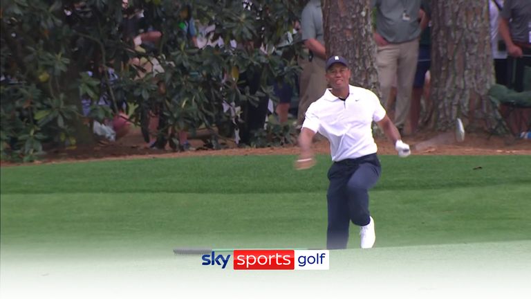 Tiger Woods appeared to be in pain following his bunker shot on the last hole of his first round.