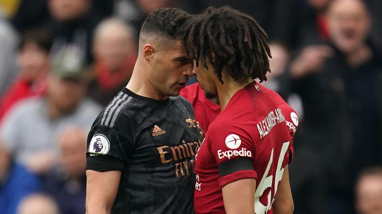 Granit Xhaka and Trent Alexander-Arnold clash in the first half
