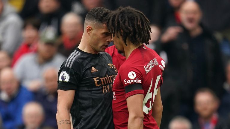 Arsenal's Granit Xhaka and Liverpool's Trent Alexander-Arnold clash during the Premier League match at Anfield, Liverpool. Picture date: Sunday April 9, 2023.