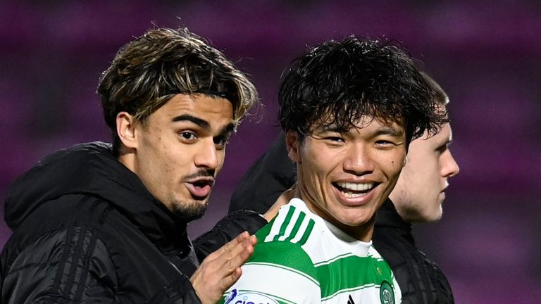 EDINBURGH, SCOTLAND - JANUARY 26: Cetlic's Jota (left) with Reo Hatate at full time during a cinch Premiership match between Hearts and Celtic at Tynecastle Park , on January 26, 2022, in Edinburgh, Scotland. (Photo by Rob Casey / SNS Group)