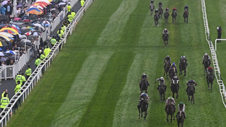 Jockey Ben Harvey riding Fennor Cross wins the Handicap Hurdle race on the second day of the Grand National Festival horse race meeting at Aintree Racecourse in Liverpool, north-west England, on April 14, 2023