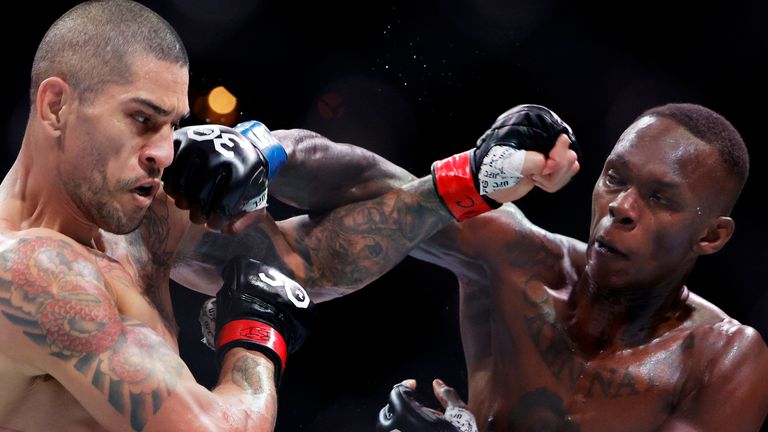 Israel Adesanya (R) of Nigeria punches Alex Pereira of Brazil in their middleweight title bout during UFC 287