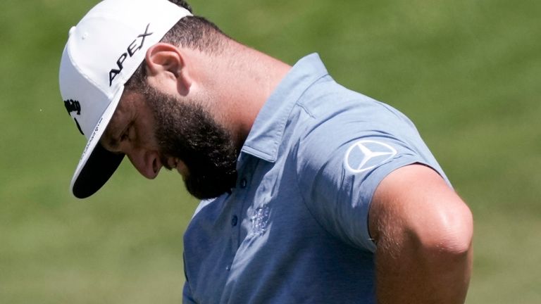 Jon Rahm, of Spain, reacts to missing a putt on the 10th green during the Mexico Open golf tournament's second round in Puerto Vallarta, Mexico, Friday, April 28, 2023. (AP Photo/Moises Castillo)