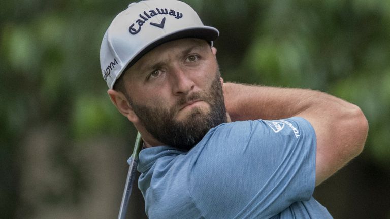 Jon Rahm, of Spain, watches his drive down the 12th fairway during the first round of the RBC Heritage golf tournament, Thursday, April 13, 2023, in Hilton Head Island, S.C. (AP Photo/Stephen B. Morton)