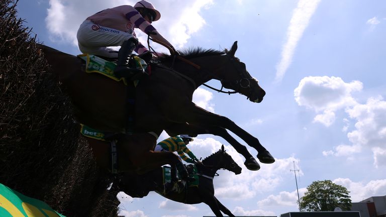 Jonbon (far) in action at Sandown under Aidan Coleman