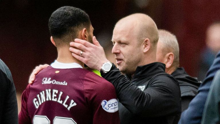 EDINBURGH, SCOTLAND - APRIL 22: Hearts' interim manager Steven Naismith (R) embraces Josh Ginnelly after subbing him off during a cinch Premiership match between Heart of Midlothian and Ross County at Tynecastle Park, on April 22, 2023, in Edinburgh, Scotland. (Photo by Mark Scates / SNS Group)