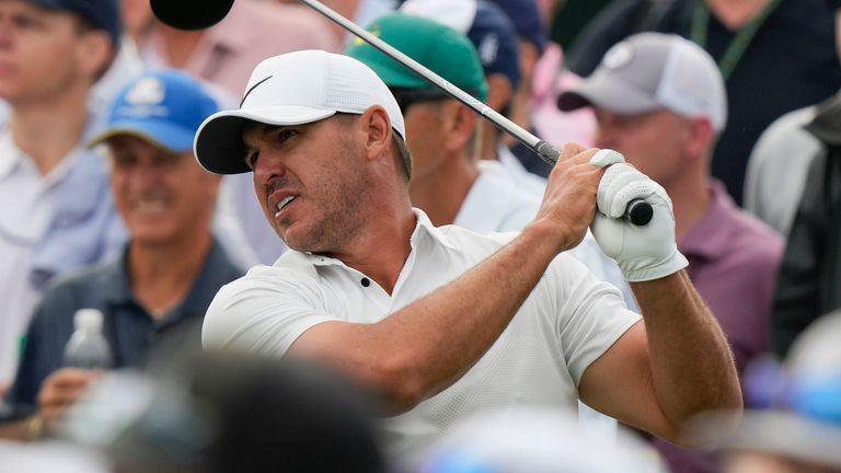Brooks Koepka watches his tee shot on the eighth hole during the second round of the Masters golf tournament at Augusta National Golf Club on Friday, April 7, 2023, in Augusta, Ga. (AP Photo/Charlie Riedel)