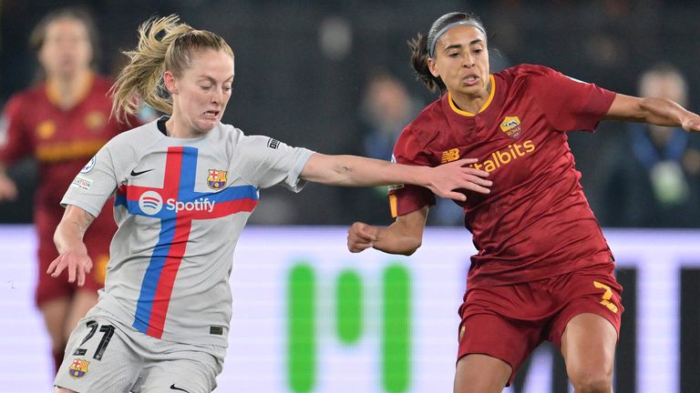 Barcelona&#39;s Keira Walsh, left, and Roma&#39;s Alves da Silva Andressa battle for the ball during the women&#39;s Champions League soccer match between Roma and Barcelona at Olimpic Stadium, Rome, Italy, Tuesday March 21, 2023. (Alfredo Falcone/LaPresse via AP)