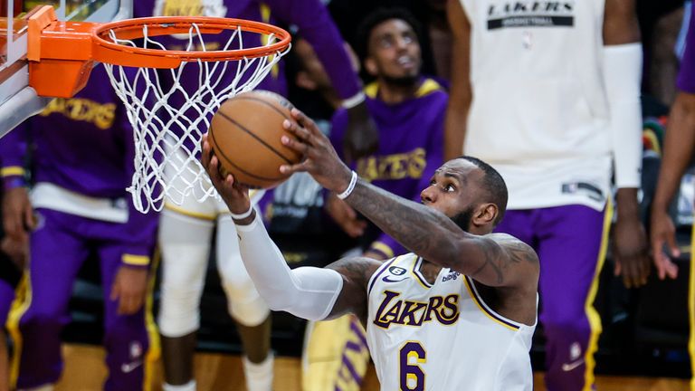 LeBron James dunks in the Lakers' 111-101 win over the Grizzlies in game three of their first round playoff series