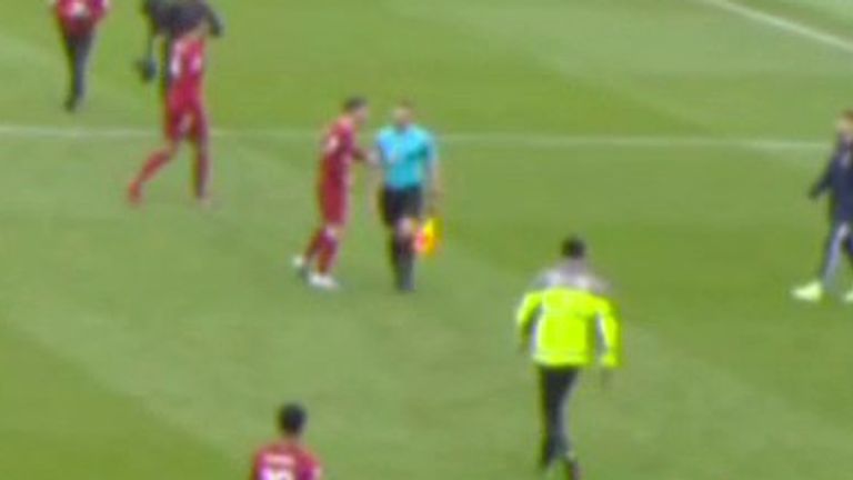 Robertson goes to approach the linesman at the end of the first half