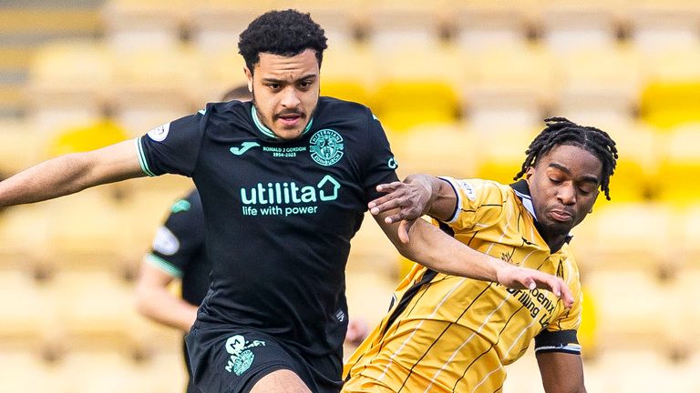 LIVINGSTON, SCOTLAND - MARCH 04: Hibernian&#39;s CJ Egan-Riley (L) and Livingston&#39;s Stephane Omeonga in action during a cinch Premiership match between Livingston and Hibernian at the Tony Macaroni Arena, on March 04, 2023, in Livingston, Scotland. (Photo by Roddy Scott / SNS Group).