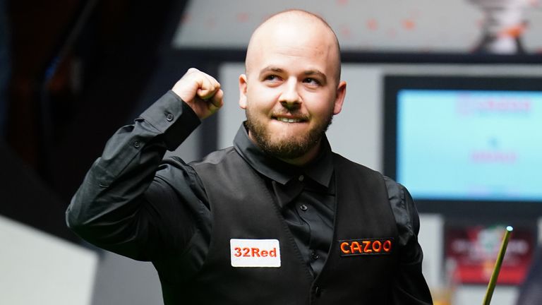 Luca Brecel celebrates his win in the Snooker World Championship final