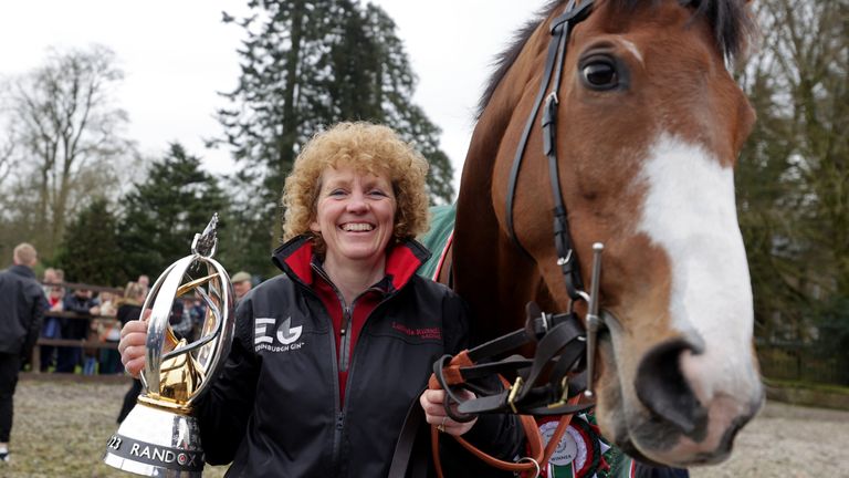 Corach Rambler and trainer Lucinda Russell with the Grand National trophy