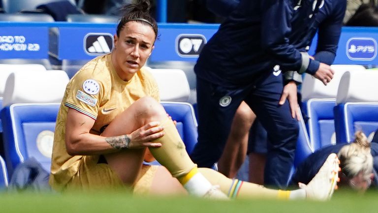Barcelona&#39;s Lucy Bronze sits injured during the Women&#39;s Champions League semi-final, first leg at Stamford Bridge