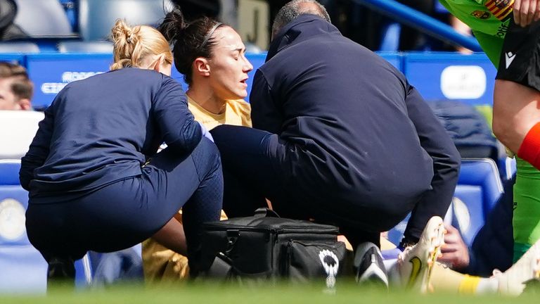 Lucy Bronze receives treatment for an injury