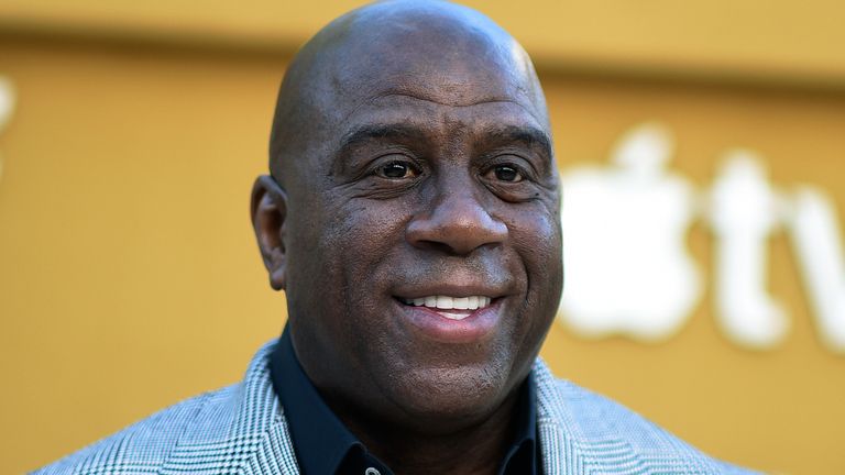 FILE - Magic Johnson arrives at the premiere of "They Call Me Magic" on Thursday, April 14, 2022, at Regency Village Theatre in Los Angeles