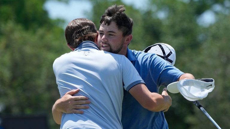 Matt Fitzpatrick, left, celebrates with his brother Alex Fitzpatrick, both of England, after finishing the day on the ninth green during the first round of the PGA Zurich Classic golf tournament at TPC Louisiana in Avondale, La., Thursday, April 20, 2023. (AP Photo/Gerald Herbert)