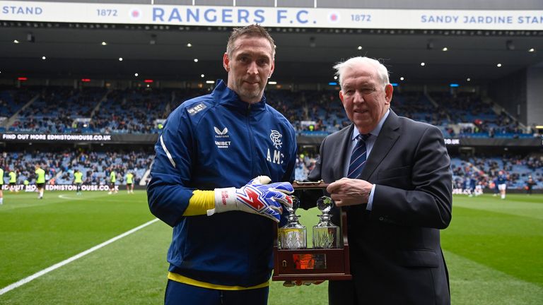 GLASGOW, SCOTLAND - APRIL 01: John Greig makes a presentation to Allan McGregor ahead of his 500th appearance for Rangers during a cinch Premiership match between Rangers and Dundee United at Ibrox, on April 01, 2023, in Glasgow, Scotland.  (Photo by Rob Casey / SNS Group)