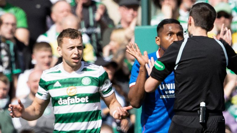 GLASGOW, SCOTLAND - APRIL 08: Rangers' Alfredo Morelos (R) protests his innocence after his goal is disallowed for a foul on Celtic's Alistair Johnston during a cinch Premiership match between Celtic and Rangers at Celtic Park, on April 08, 2023, in Glasgow, Scotland.  (Photo by Alan Harvey / SNS Group)