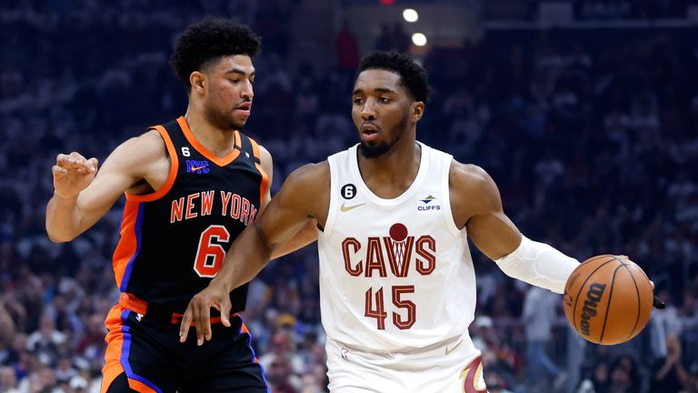 Cleveland Cavaliers guard Donovan Mitchell (45) drives against New York Knicks guard Quentin Grimes (6) during the first half of Game 2 of an NBA basketball first-round playoff series Tuesday, April 18, 2023, in Cleveland. (AP Photo/Ron Schwane)