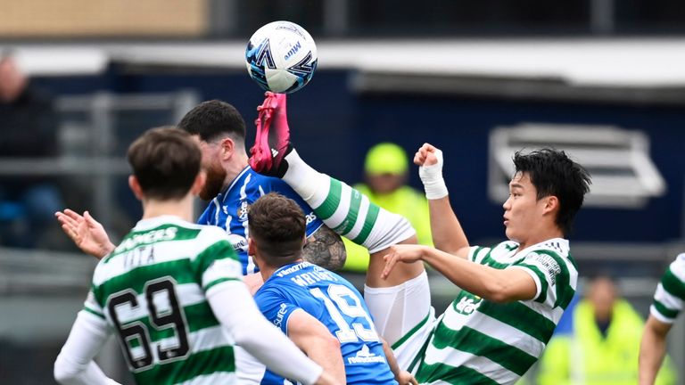 KILMARNOCK, SCOTLAND - APRIL 16: Hyeongyu Oh with a high tackle on Liam Donnelly during a cinch Premiership match between Kilmarnock and Celtic at Rugby Park, on April 16, in Kilmarnock, Scotland.  (Photo by Rob Casey / SNS Group)
