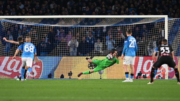 Napoli goalkeeper Alex Meret saves Olivier Giroud's penalty