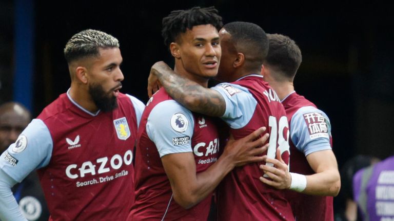 Ollie Watkins is mobbed by his team-mates after opening the scoring for Aston Villa at Chelsea