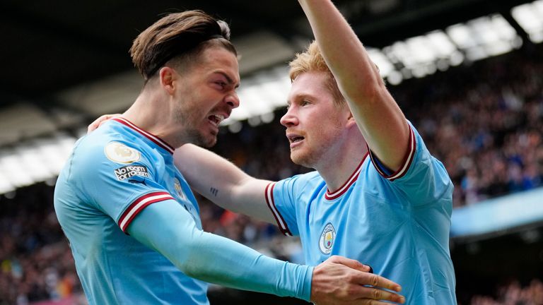 Goalscorers Jack Grealish and Kevin De Bruyne celebrate during Man City's demolition of Liverpool
