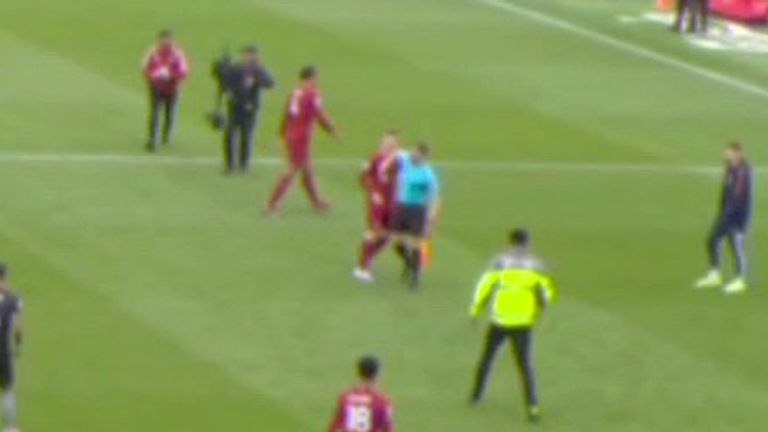 The linesman's elbow then appears to hit Robertson in the face