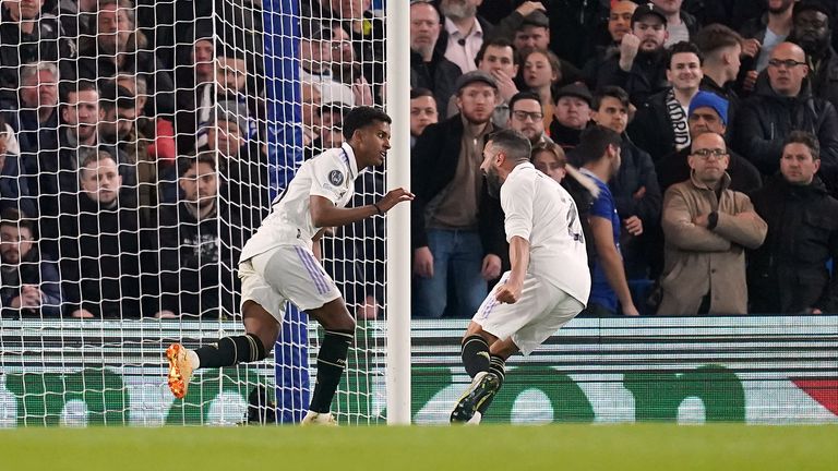 Rodrygo celebrates with Dani Carvajal after doubling his and Real Madrid's tally at Stamford Bridge