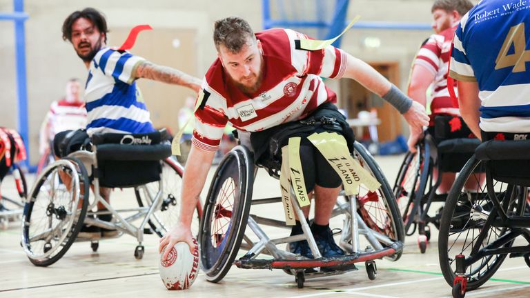 Picture by John Clifton/SWpix.com - 19/03/2023 - Rugby League - Betfred Wheelchair Super League - Wigan Warriors v Halifax Panthers - Robin Park Arena, Wigan, England -.Wigan Warriors' Matt Wooloff scores a try