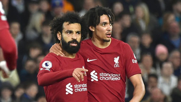 Liverpool&#39;s Trent Alexander-Arnold, right, and Liverpool&#39;s Mohamed Salah celebrate after Liverpool&#39;s Cody Gakpo scored his side&#39;s opening goal during the English Premier League soccer match between Leeds United and Liverpool at Elland Road in Leeds, England, Monday, April 17, 2023. (AP Photo/Rui Vieira)