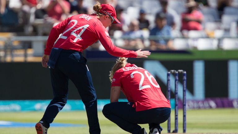 England's Charlie Dean consoles England's Katherine Sciver-Brunt after a narrowly missed wicket against South Africa during the Women's T20 World Cup semi final cricket match in Cape Town, South Africa, Friday Feb. 24, 2023