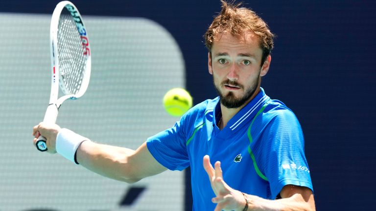 Daniil Medvedev, of Russia, returns a shot from Jannik Sinner, of Italy, during the men&#39;s singles finals of the Miami Open tennis tournament, Sunday, April 2, 2023, in Miami Gardens, Fla. (AP Photo/Wilfredo Lee)