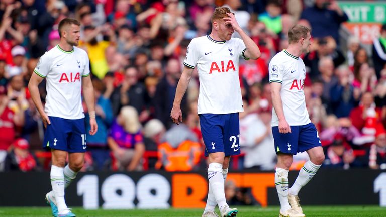 Tottenham players show the strain in the first half at Anfield