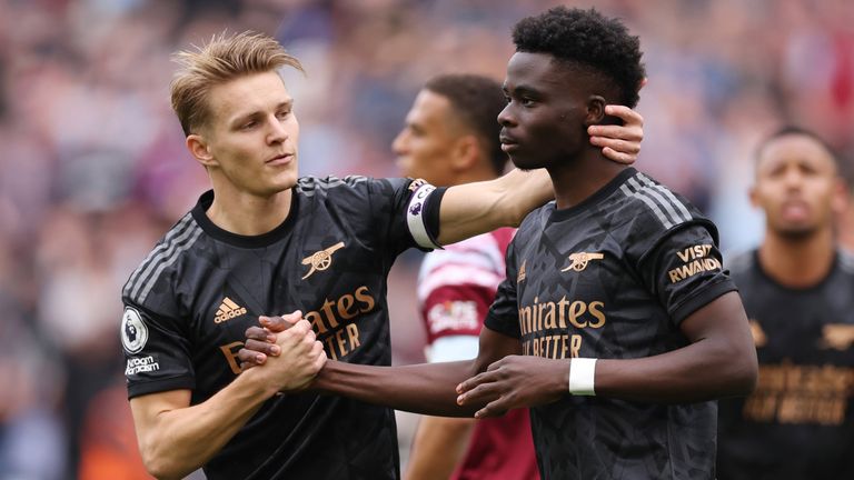 Martin Odegaard consoles Bukayo Saka after his missed penalty