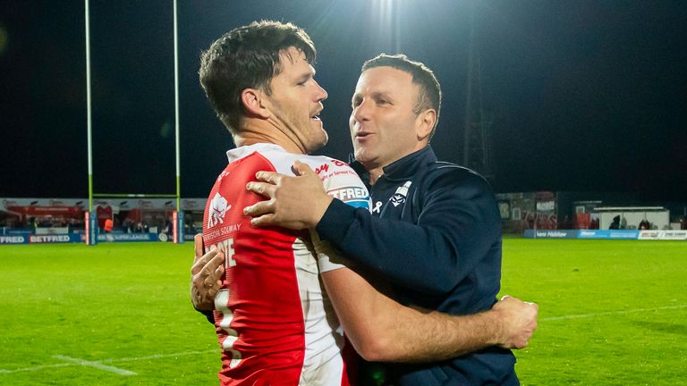 Picture by Allan McKenzie/SWpix.com - 14/04/2023 - Rugby League - Betfred Super League Round 9 - Hull KR v St Helens - Sewell Group Craven Park, Hull, England - Hull KR's coach Willier Peters congratulates Lachlan Coote after victory over St Helens.