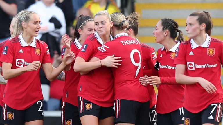 Alessia Russo is congratulated by her team-mates after giving Manchester United a 2-1 lead against Brighton