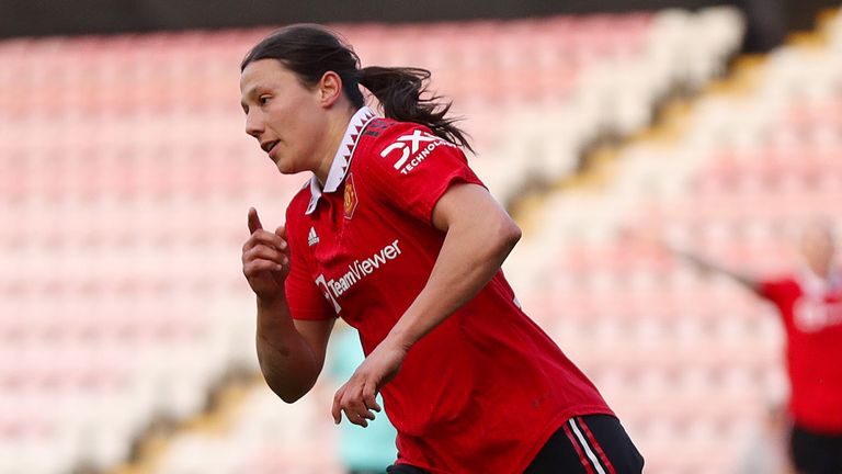 Rachel Williams celebrates after her 89th-minute strike gives Manchester United a 3-2 lead against Brighton