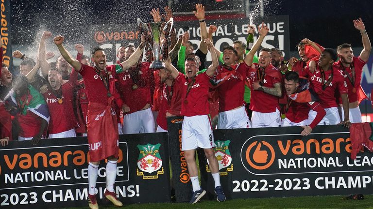 Wrexham players celebrated promotion to the EFL after hitting 110 points for the season with a 3-1 win over Boreham Wood