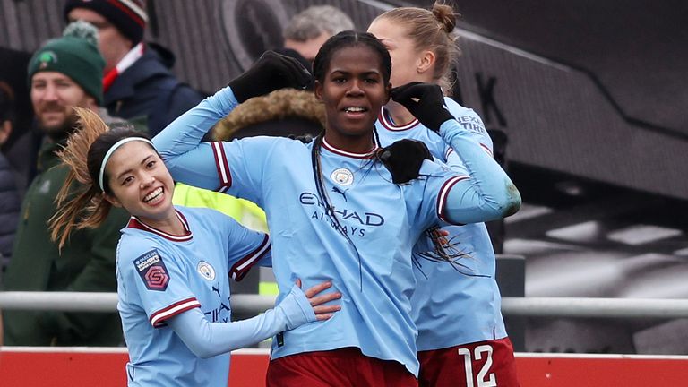 Khadija Shaw celebrates after giving Manchester City an early lead against Arsenal