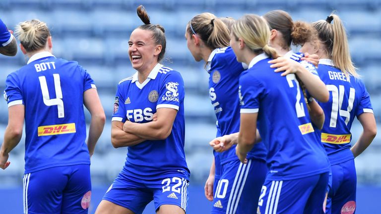 Ashleigh Plumptre celebrates with her team-mates after scoring Leicester's third goal against Liverpool