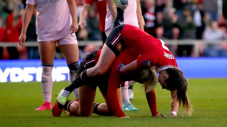 Alessia Russo is mobbed by team-mate Ella Toone after scoring 