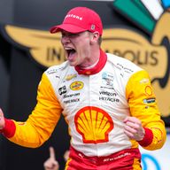Josef Newgarden celebrates after winning the 107th running of the Indy 500