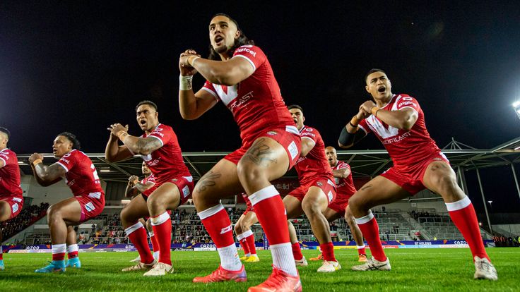 Picture by Allan McKenzie/SWpix.com - 24/10/2022 - Rugby League - Rugby League World Cup 2021 - Tonga v Wales - The Totally Wicked Stadium, St Helens, England - Tonga's Keaon Koloamatangi performs the haka against Wales.