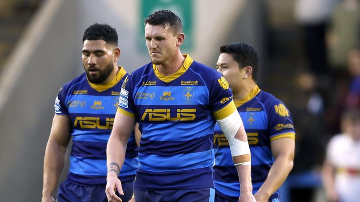 Warrington Wolves v Wakefield Trinity - Betfred Super League - Halliwell Jones Stadium
Wakefield Trinity players appear dejected as Warrington Wolves celebrate a try during the Betfred Super League match at the Halliwell Jones Stadium, Warrington. Picture date: Friday May 5, 2023.