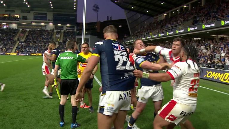 Tempers flare in Leeds Rhinos' match against St Helens in the dying moments of regular time, with James McDonnell being shown a red card for throwing a punch